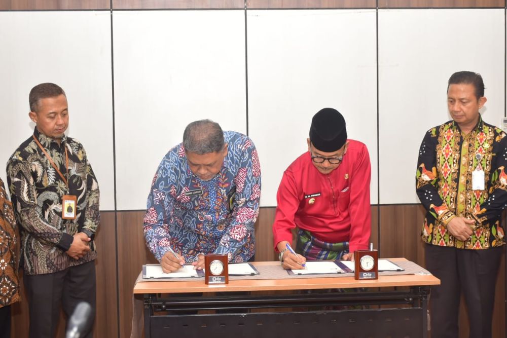 Penandatanganan MoU Pemkab Kampar dengan DJP Riau