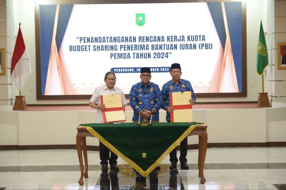 Penandatanganan kuota budget sharing penerima bantuan iuran Pemprov Riau