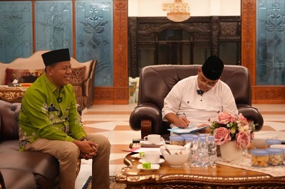 Gubernur Edy Natar bersama Bupati Kuansing Suhardiman Amby