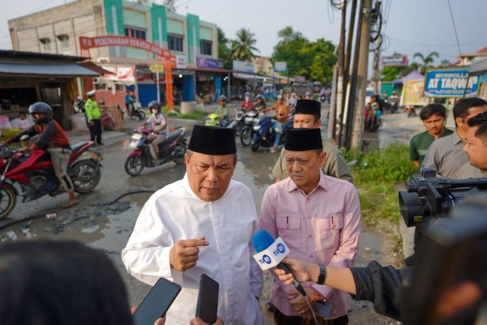 Jalan Suka Karya Kampar yang rusak parah