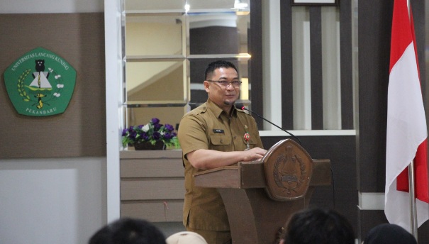 Kepala Dinas Perkebunan Riau, Syahrial Abdi