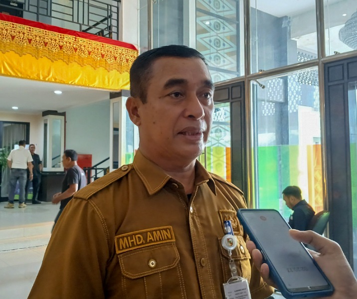 Kepala Disdalduk KB Pekanbaru M Amin. Foto: Surya/Riau1.