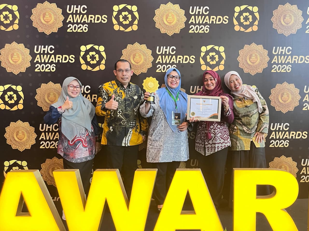 Pemkab Rohil terima UHC Award 2026