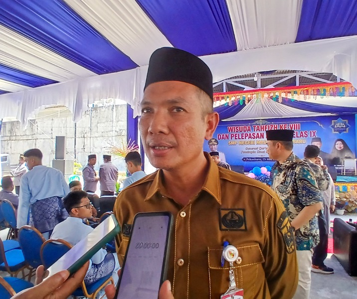 Plt Kepala Disdik Pekanbaru Alek Kurniawan. Foto: Surya/Riau1.