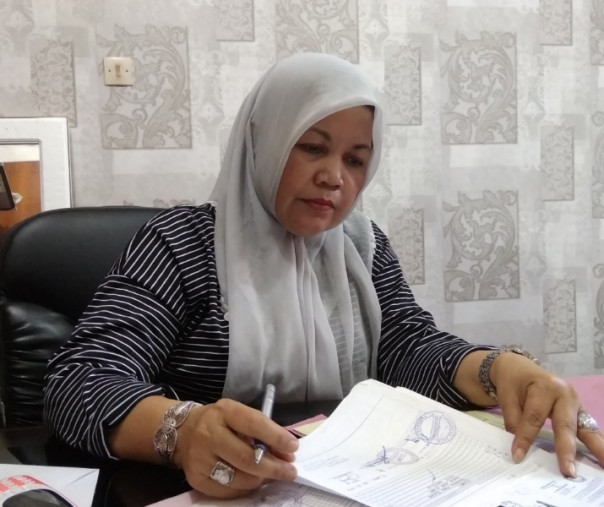 Kepala Bidang Pendaftaran Penduduk Disdukcapil Pekanbaru Inang Tati Dewi. Foto: Surya/Riau1.
