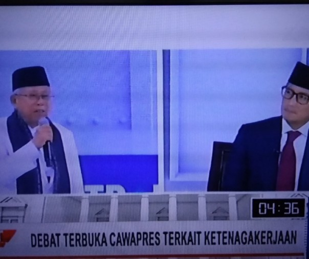 Cawapres 01 KH Ma'ruf Amin dan Cawapres 02 Sandiaga Uni (kanan) saat debat cawapres. Foto: Riau1.