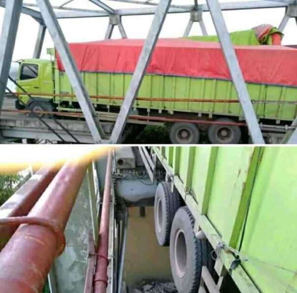 Ini penampakan Jembatan Way Mesuji Lampung-Sumsel yang jebol saat dilewati truk tronton, Senin dini hari WIB. 
