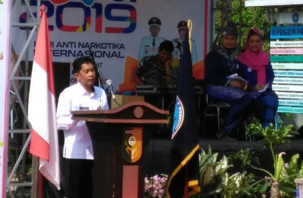 Asisten Tata Pemerintahan Pemkab Kuansing, Muhjelan Arwan saat peringatan Hari Anti Narkotika Internasional (HANI) 2019 di Kuansing