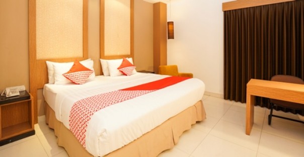 Salah satu kamar di OYO Hotel & Homes