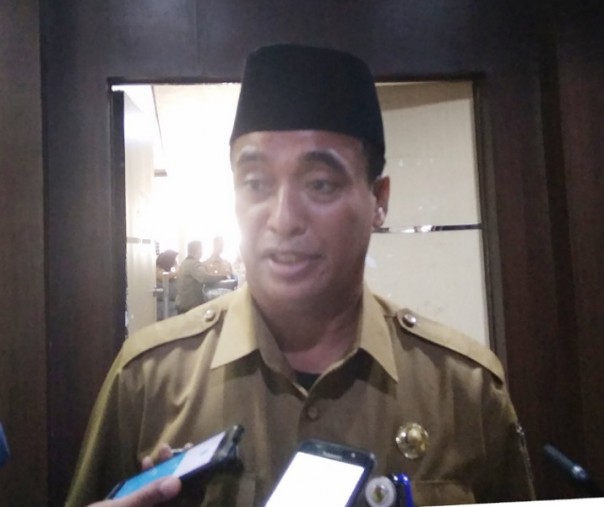 Kepala Disdalduk-KB Kota Pekanbaru Muhammad Amin. Foto: Surya/Riau1.