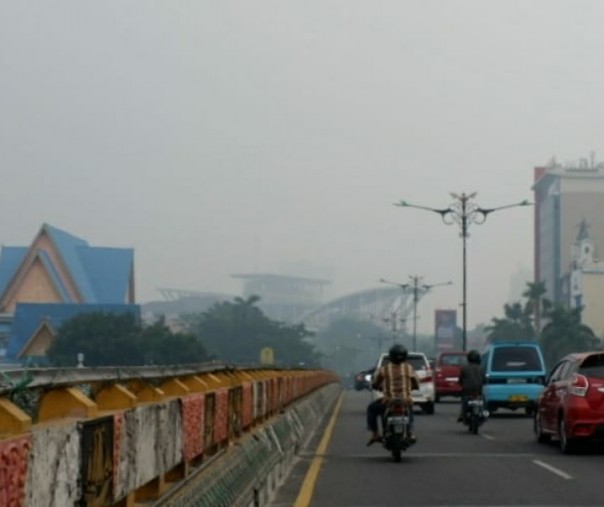 Kabut asap di Pekanbaru (foto dokumentasi riau1)
