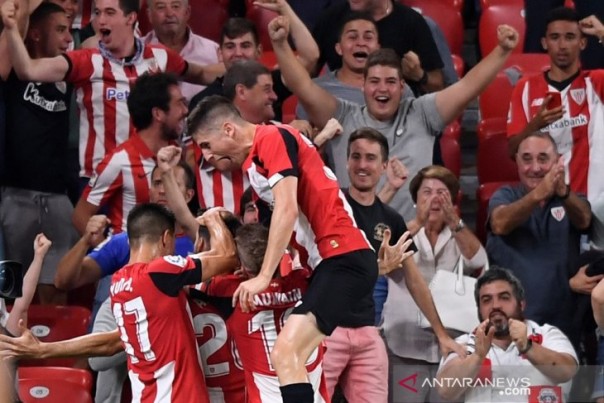 Pemain Athletic Bilbao merayakan gol kemenangan, Sabtu dini hari WIB. 