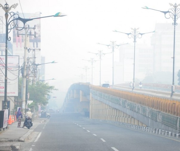 Kabut asap di Pekanbaru (Foto:riau24.com)