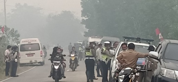 Kabut asap pekat sambut Jokowi di Merbau Pelalawan