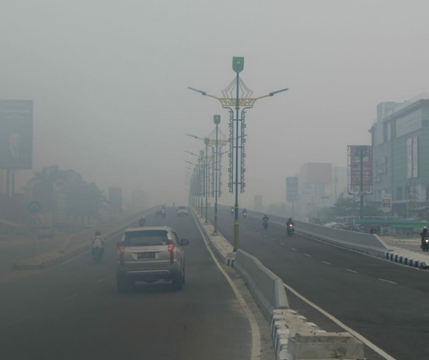 Kabut asap di Pekanbaru (foto dokumentasi riau1)