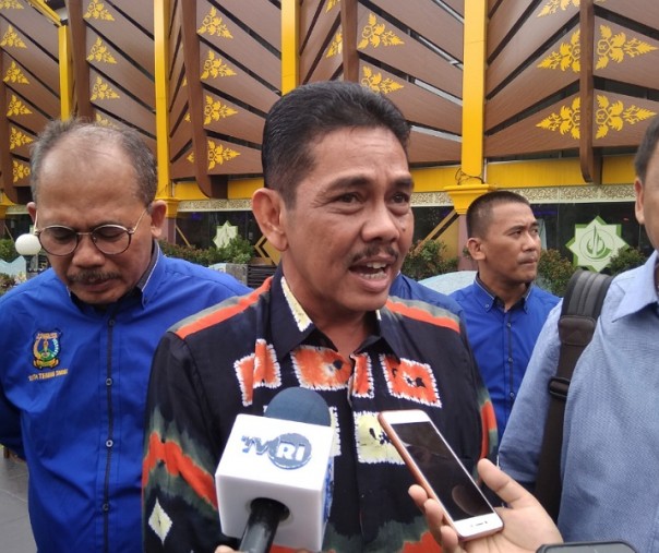 Asisten Ekonomi Pembangunan Kota Tebing Tinggi Muhammad Dimiyati di sela-sela kunjungan di MPP Pekanbaru, Kamis (10/10/2019). Foto: Surya/Riau1.