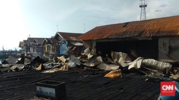 Rumah warga yang dibakar massa di Pelabuhan Penajam Paser Utara, Rabu lalu. 
