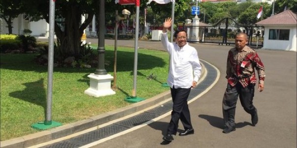 Mahfud MD saat tiba di Istana Negara, Senin pagi. 