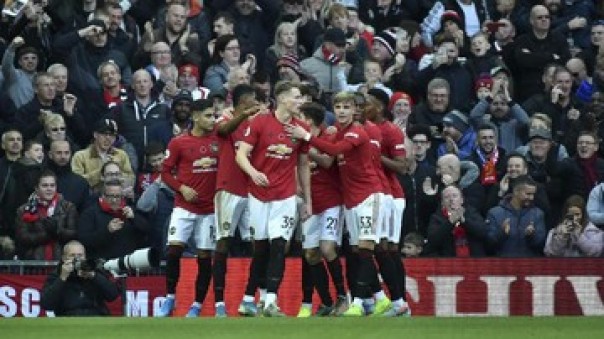 Pemain Manchester United meluapkan kegembiraannya, Minggu malam. 