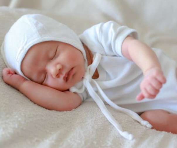 Ilustrasi bayi pakai topi. Foto: Shutter Stock.