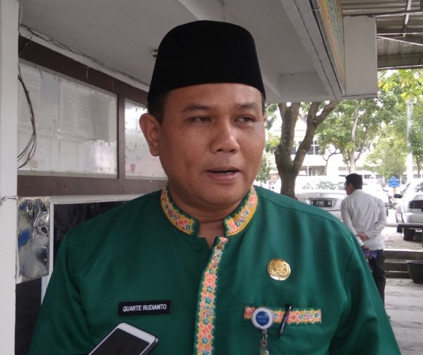 Kepala Bidang Pengaduan Kebijakan Pelaporan dan Layanan DPMPTSP Kota Pekanbaru Quarte Rudianto. Foto: Surya/Riau1.
