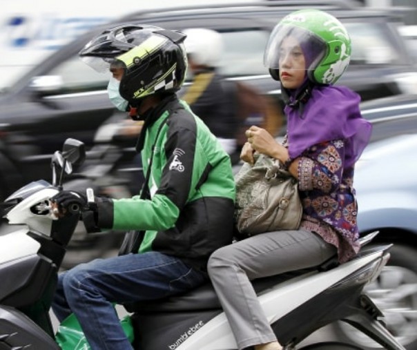 Layanan transportasi online GoJek. Foto: Reuters