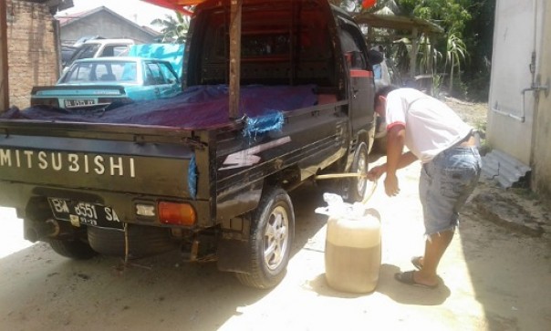 Mobil warga yang mati mendadak usai mengisi Bahan Bakar Di SPBU 14.284.617, Kelurahan Perawang, Kecamatan Tualang Kabupaten Siak, Sabtu 14 Maret 2020.