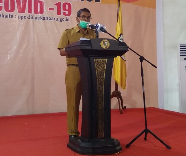 Juru Bicara Tim Gugus Tugas Penanganan Corona Virus Disease 2019 (Covid-19) Kota Pekanbaru Dokter Mulyadi dalam konferensi pers, Senin (6/4/2020). Foto: Surya/Riau1.