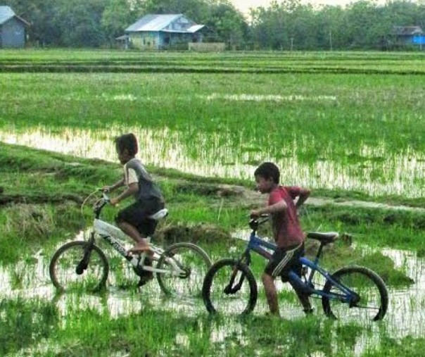 Ilustrasi anak bermain sepeda (Foto: Istimewa/internet)