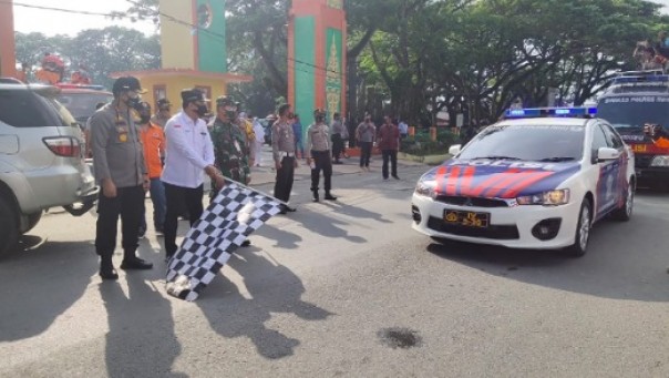 Wahup Inhu didampingi Dandim dan Kapolres melepas Tim Gugus Tugas Percepatan Penanganan Covid-19 Kabupaten Inhu di RTH Rengat, Sabtu 27 Juni 2020.