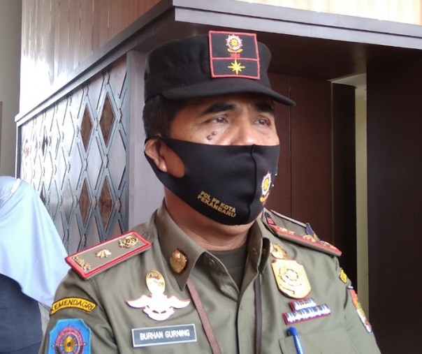 Pelaksana Tugas Kepala Satpol PP Pekanbaru Burhan Gurning. Foto: Surya/Riau1.