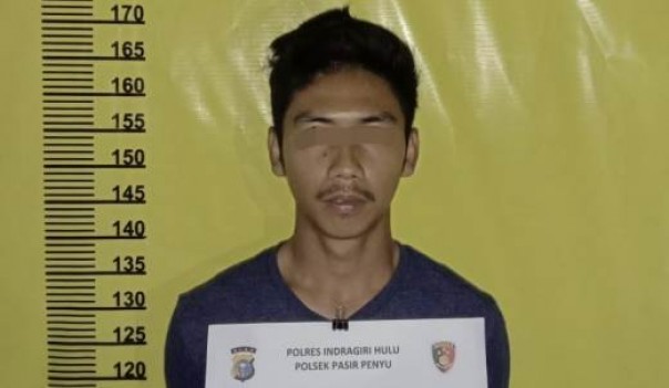 Tersangka IMG alias Imam di amankan di Polsek Pasir Penyu.