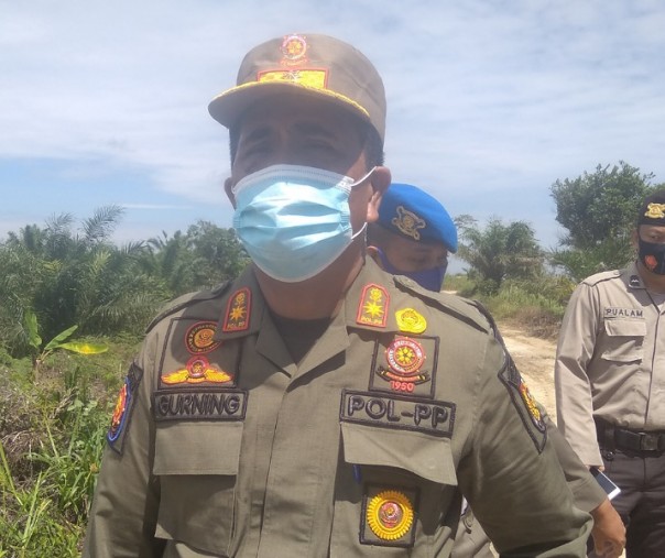 Plt Kepala Satpol PP Pekanbaru Burhan Gurning. Foto: Surya/Riau1.