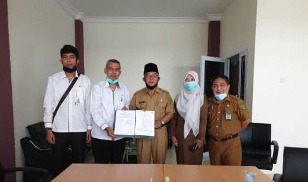 Kepala DPAD Inhil bersama Kepala KCP BP Jamsostek Inhil