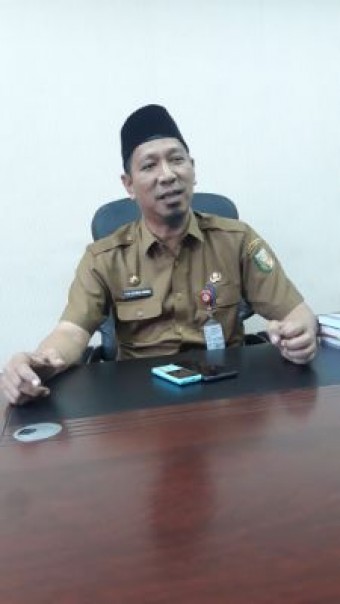 Kadis Disdukcapil Kuansing HM Reffendi Zukman, AP. MSi