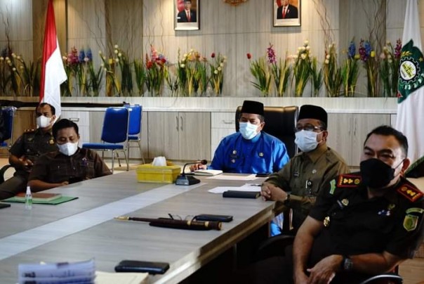 Kasus Covid 19 meningkat, Bupati Alfedri Ikut Rakornas Penegakan Disiplin Protokol Kesehatan dan Penanganan Covid-19 di Daerah