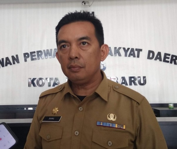 Kepala Badan Kesbangpol Pekanbaru Zulfahmi Adrian. Foto: Surya/Riau1.