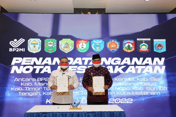 Bupati Siak saat hadir dalam penanda tanganan MoU Jaminan Perlindungan Dan Pelatihan Pekerja Migran dengan BP2MI.