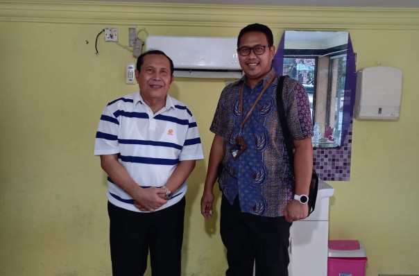 Bupati Rokan Hulu, H. Sukiman dan Manager PLN UP3 Pekanbaru, Wira Bhakti Dharma