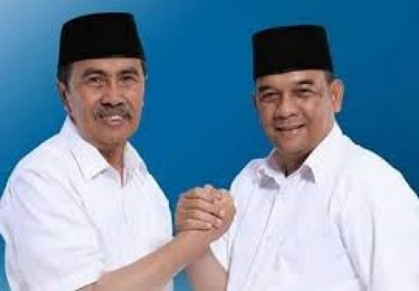 Syamsuar dan Edy Natar Nasution. 