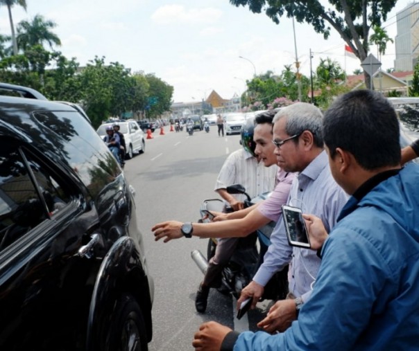 Muhammad, usai menjalani pemeriksaan sebagai saksi di Ditreskrimsus Polda Riau